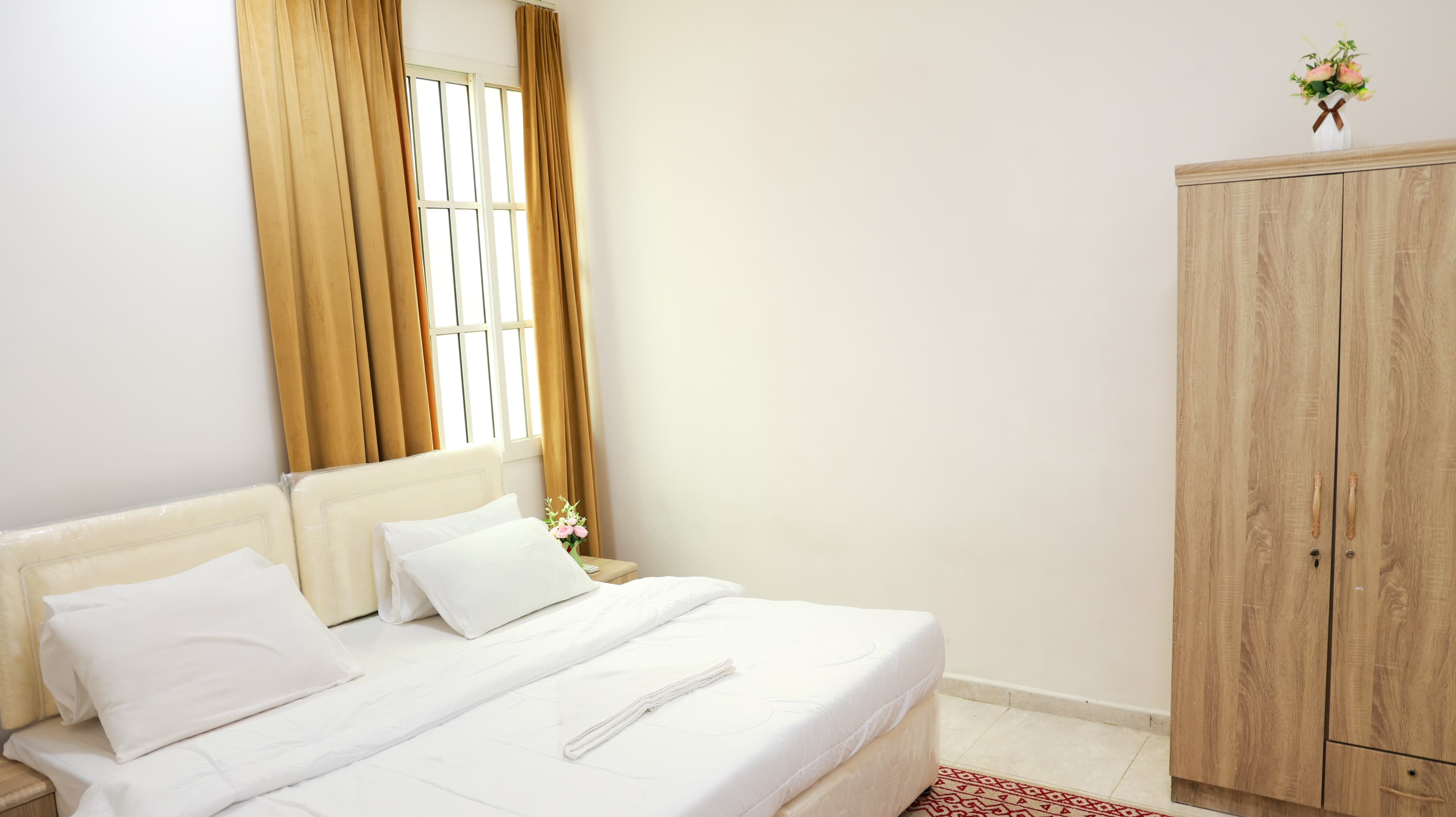 Kitchen and dining area in 2BHK Family Apartment