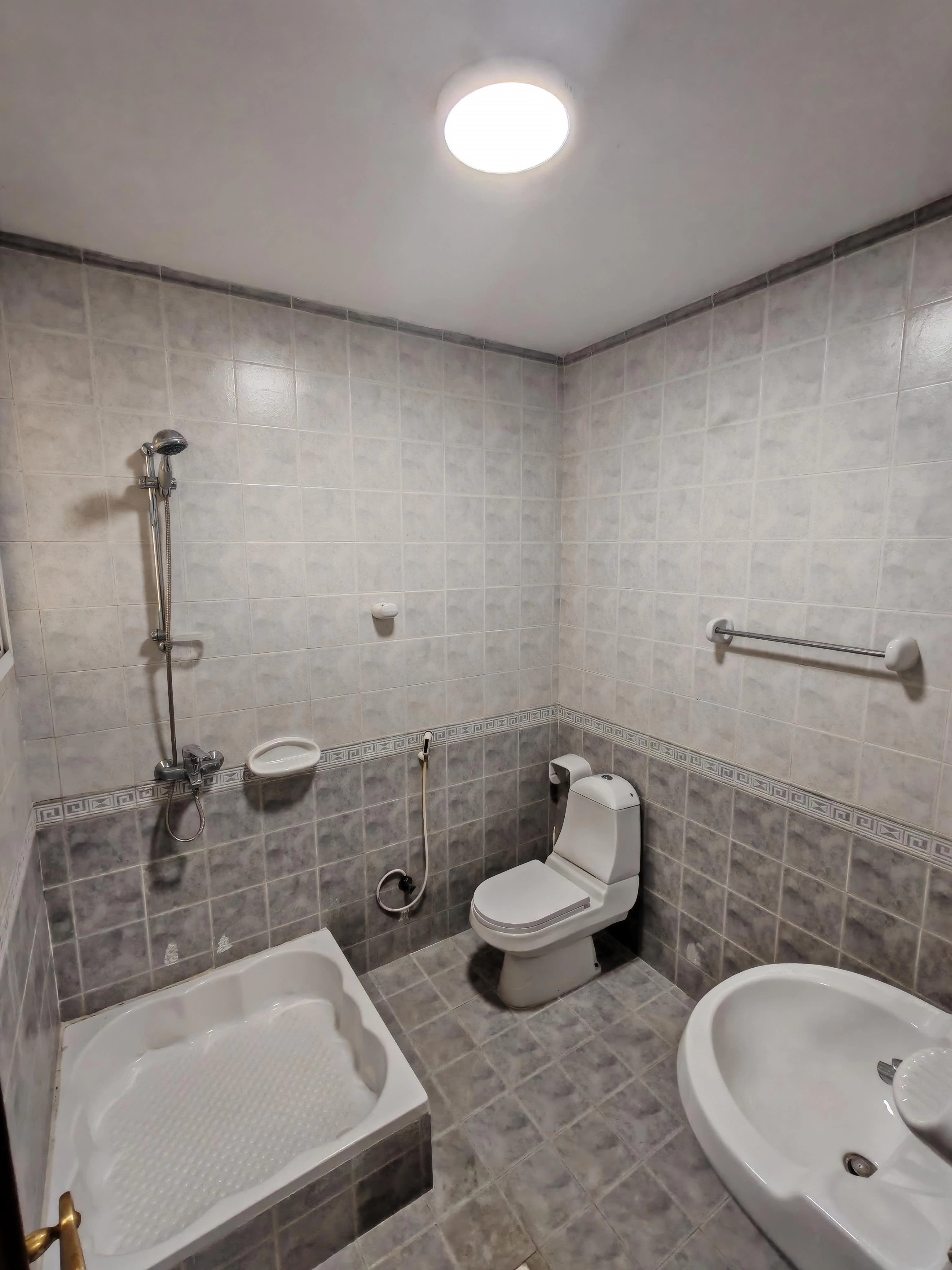 Kitchen and dining area in Luxury 2BHK-Bedroom Apartment